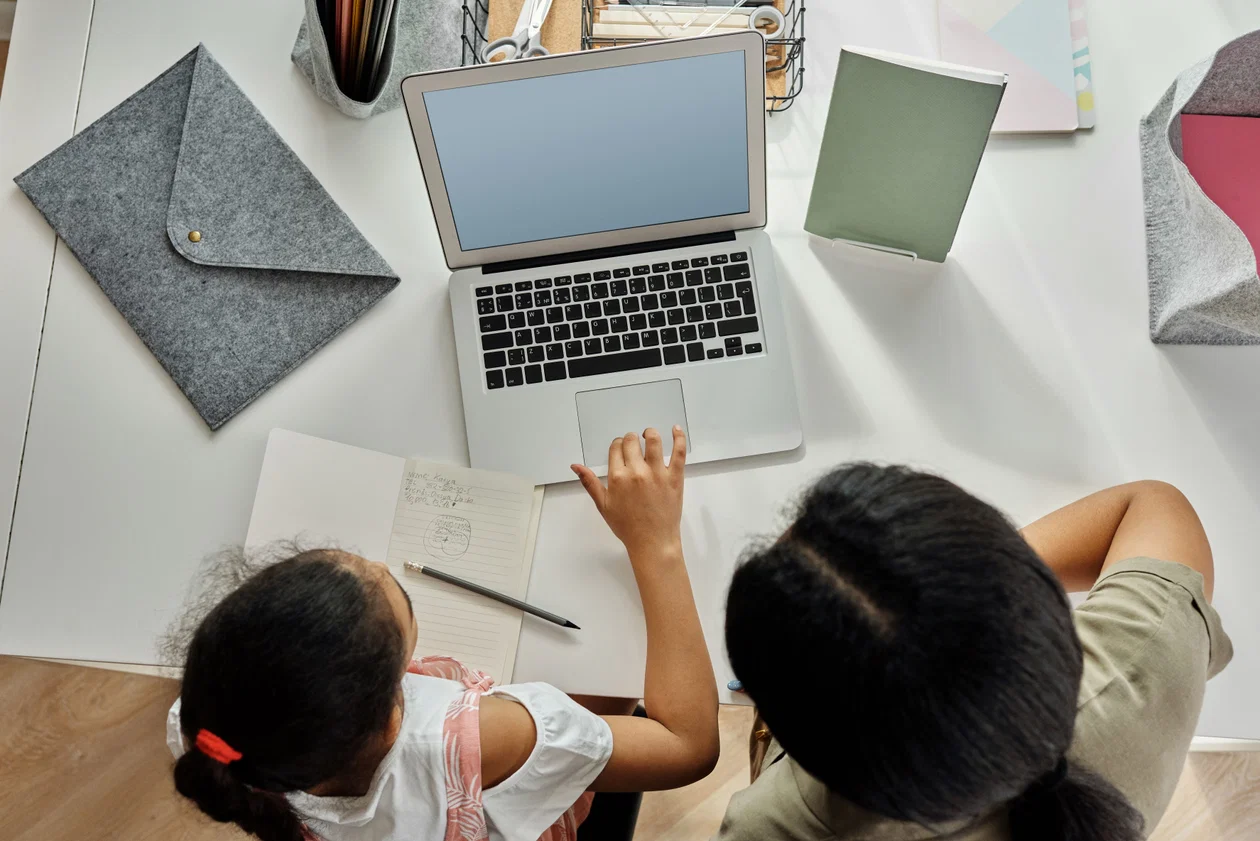 Mother helping daughter with math homework - conceptual understanding
