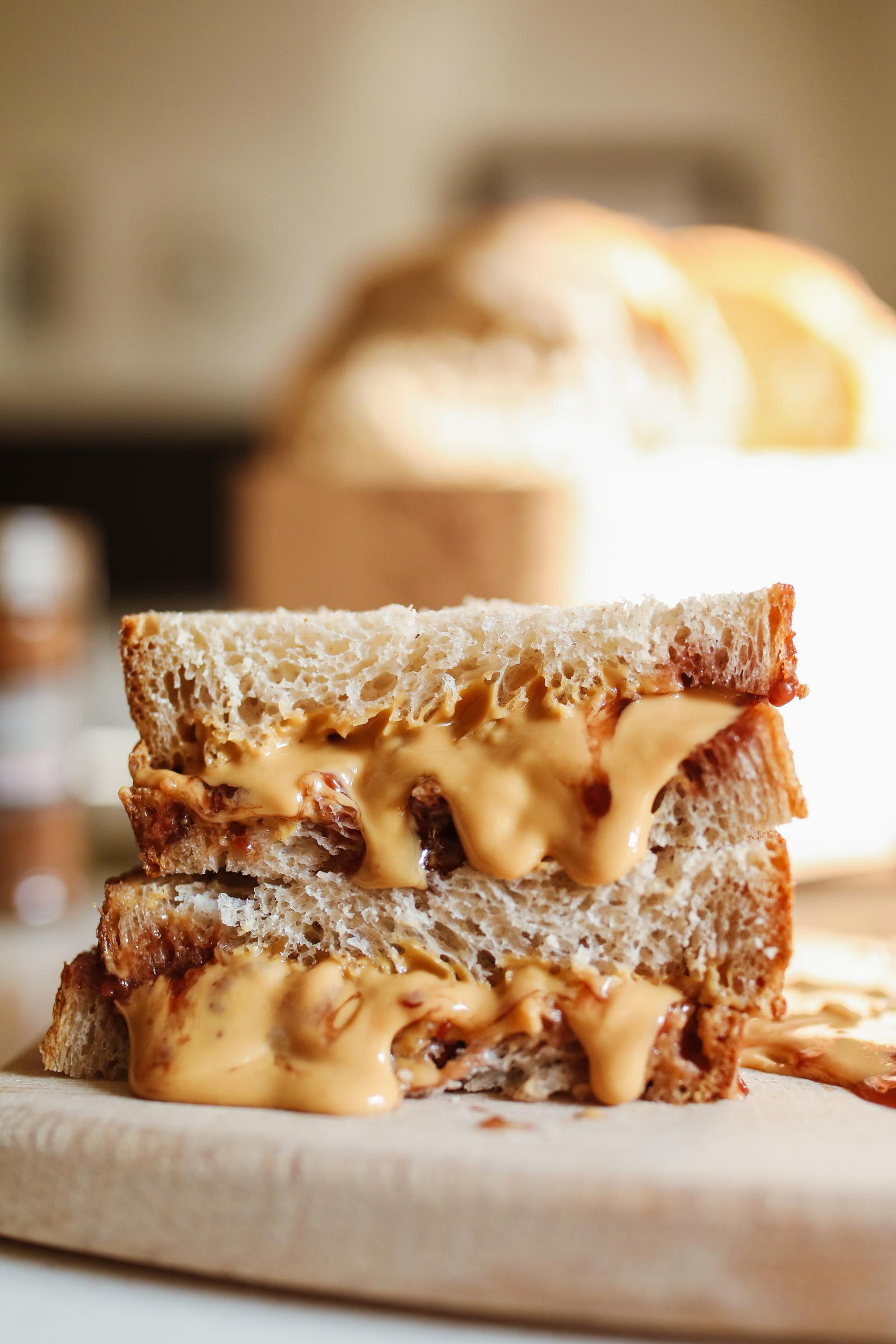 Close-up of a peanut butter sandwich slice on rustic bread