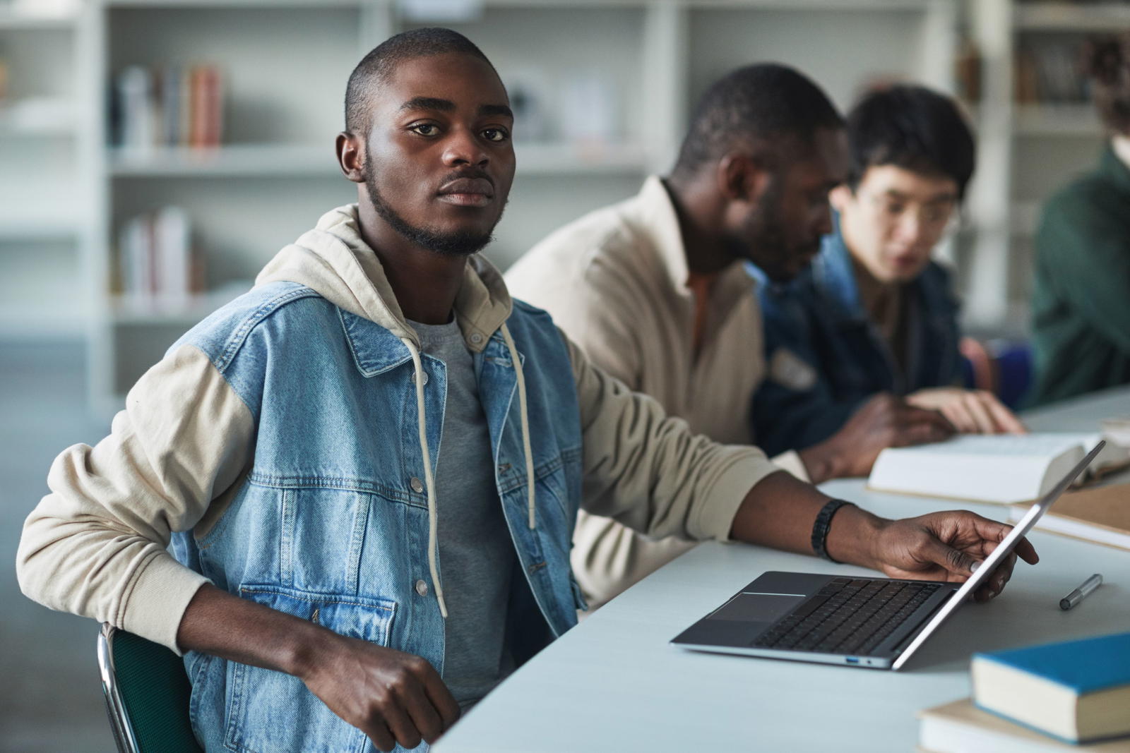 University students studying together in a library