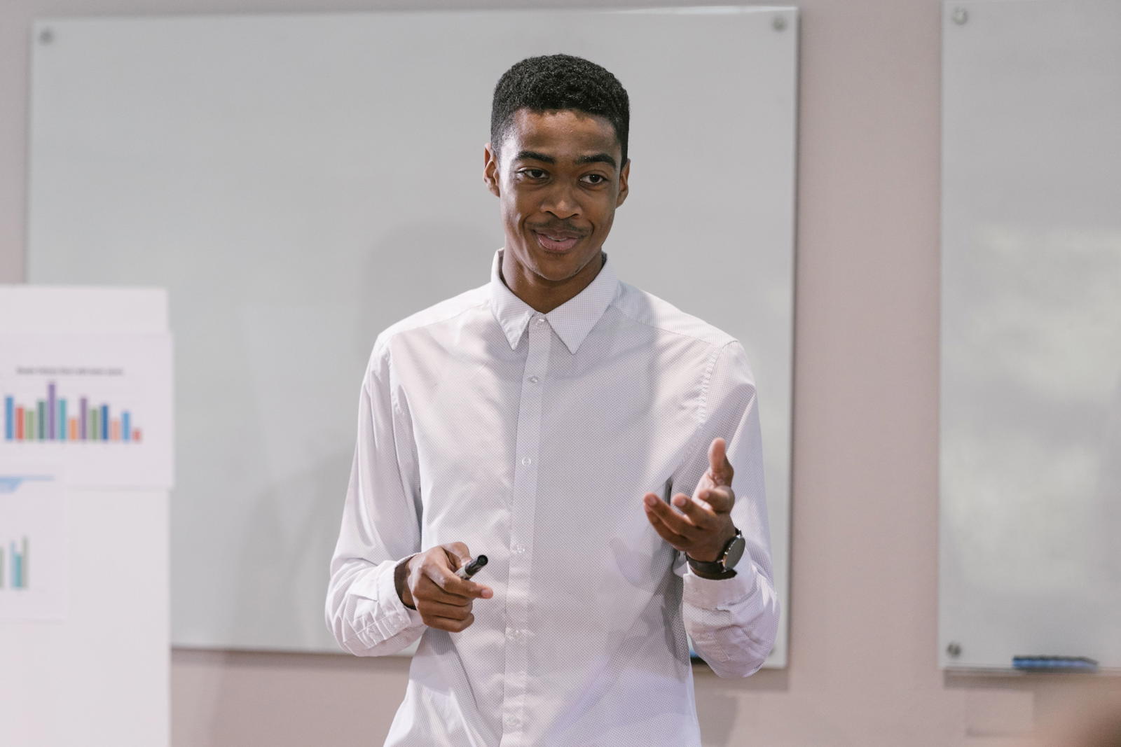 Student speaking confidently — DET 130 level flexibility
